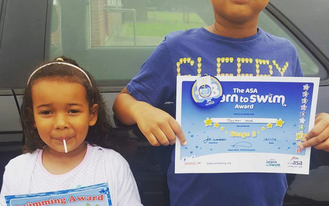 Jayden and Sasha with their certificates